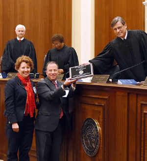 Valentine Brown and Harvey Gurland accepting the Law Firm Commendation Pro Bono Service Award