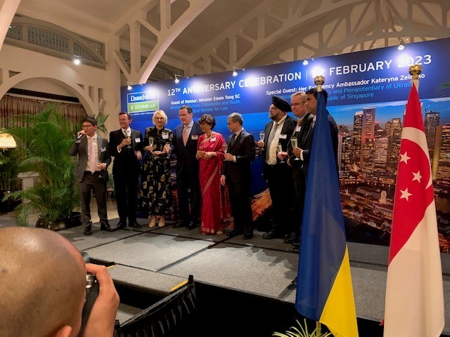 The Duane Morris & Selvam Board of Managers and honored guests toast to 12 years.