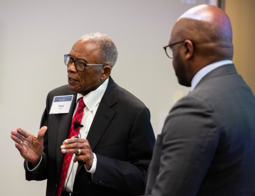 Fred Gray (left) speaks as Duane Morris Chief Diversity, Equity and Inclusion Officer Joseph K. West (right) looks on.